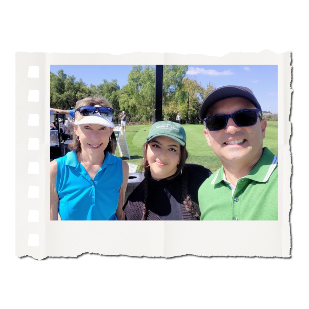 Sylvia, Christina, and Ed taking a selfie at the scholarship golf tournament.