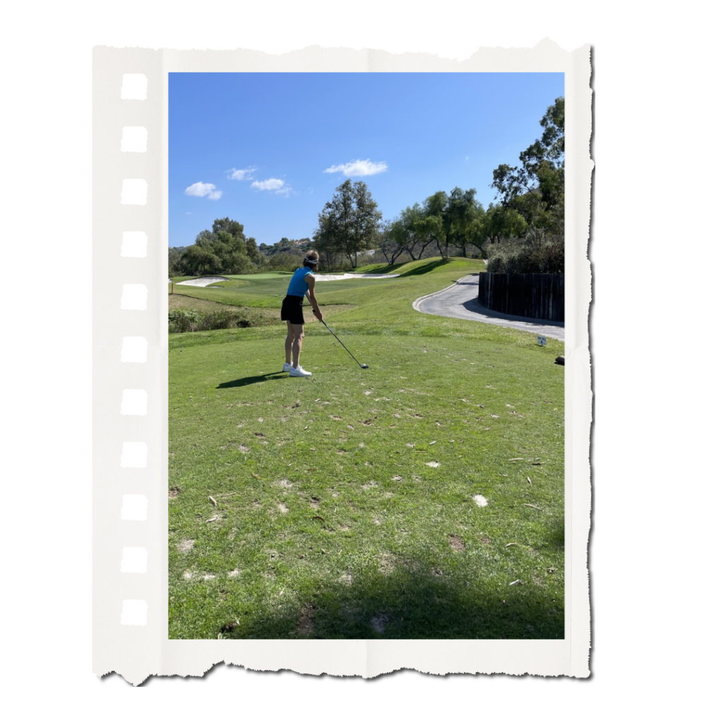 Sylvia getting ready to hit the golf ball